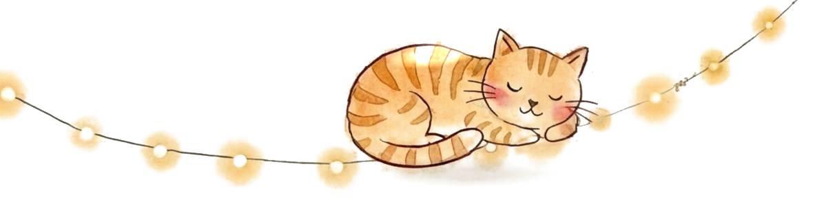 Eine schlafende Katze auf einer Lichterkette